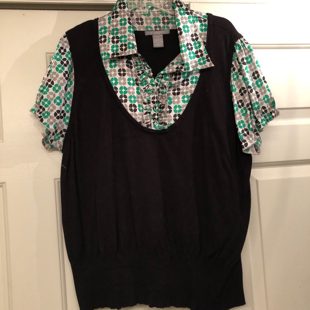 Sweater vest with attached accent shirt